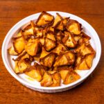 Air fryer buffalo chicken wontons on a plate &ndash; crispy high-protein appetizer with ranch dipping sauce