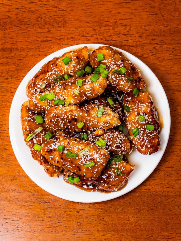 Air fryer honey garlic chicken tenders hero &ndash; crispy golden high-protein dinner recipe from Flexible Feasts