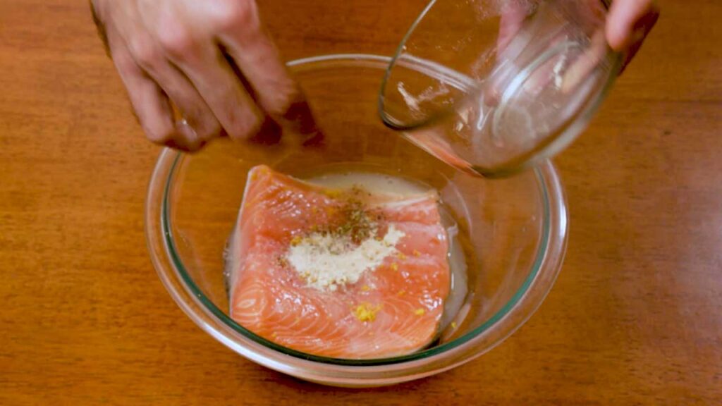 Air fryer salmon fillet close-up &ndash; crispy lemon pepper seasoned high-protein fish