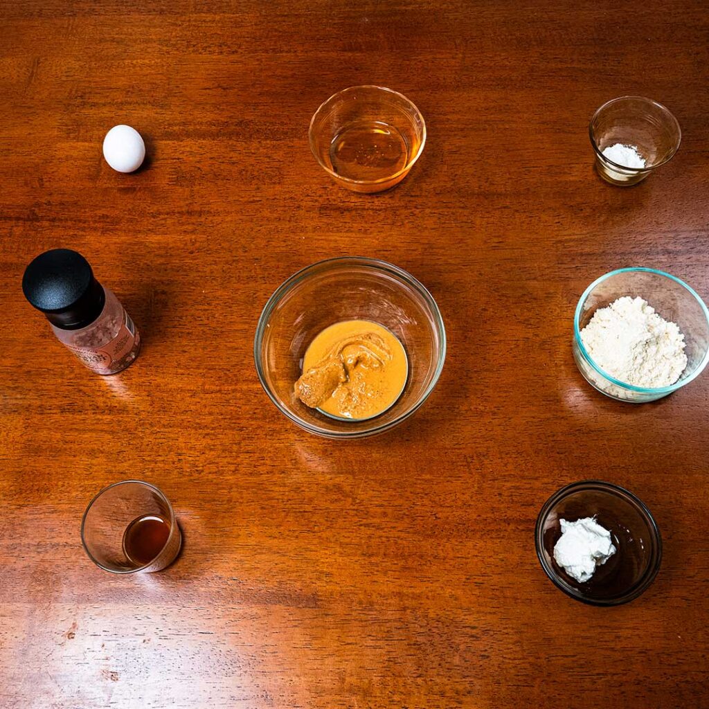 Peanut butter cookie ingredients &ndash; peanut protein powder flour and eggs for high-protein cookie recipe