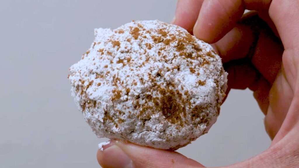 Apple cinnamon protein donuts on wire rack – fresh baked high-protein breakfast recipe