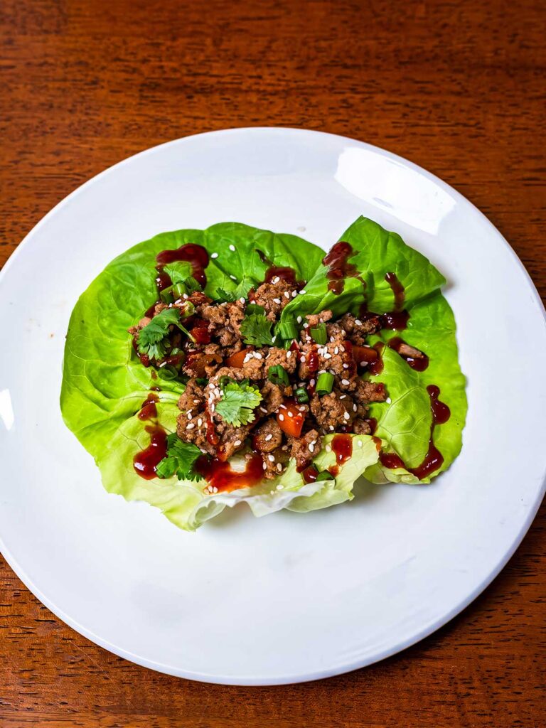 Asian lettuce wraps hero shot &ndash; high protein low carb meal with ground turkey and crisp lettuce cups