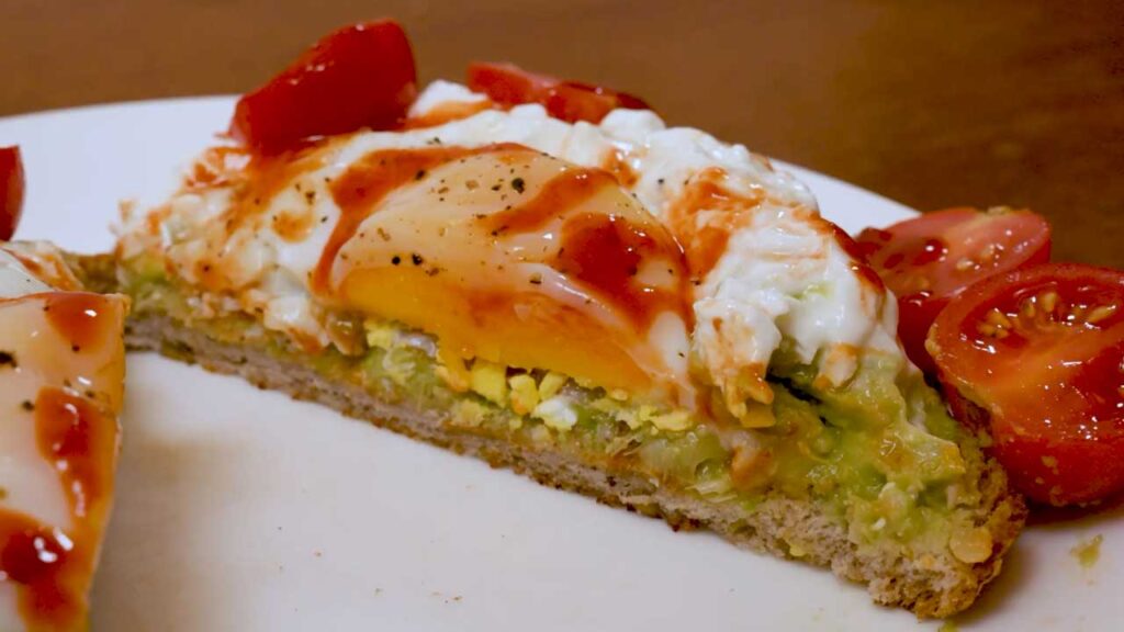 Avocado toast on rustic plate &ndash; high-protein meal prep breakfast with fresh avocado