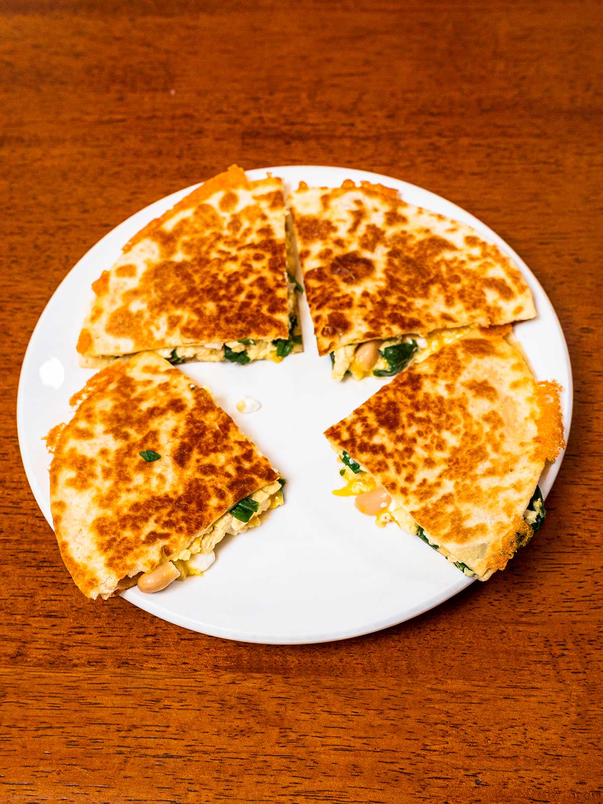 Breakfast quesadilla hero shot &ndash; high-protein breakfast with eggs, chicken, and cheese on golden tortilla