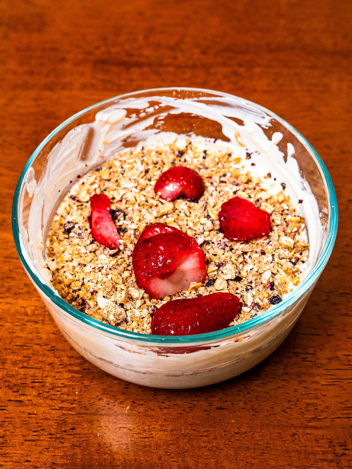 Cheesecake protein yogurt bowl hero shot &ndash; high-protein breakfast recipe with berries and granola