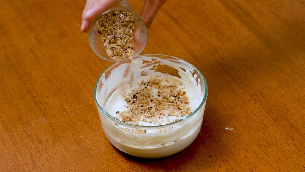 Cheesecake protein yogurt bowl close-up &ndash; topped with granola and fresh berries for high-protein breakfast