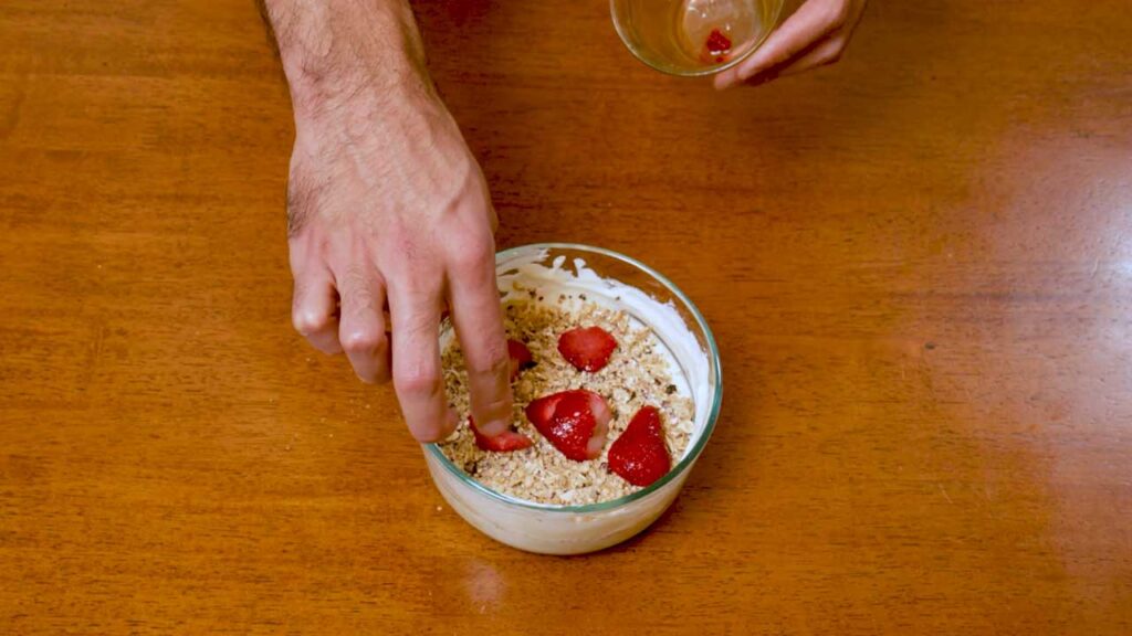 Cheesecake protein yogurt bowl overhead shot &ndash; high-protein breakfast recipe styled for food photography