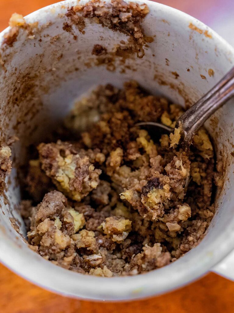 Chocolate chip banana protein mug cake close-up &ndash; fluffy high-protein single serving dessert