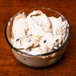 Cottage cheese ice cream recipe &ndash; creamy high-protein dessert in a glass bowl with fresh berries