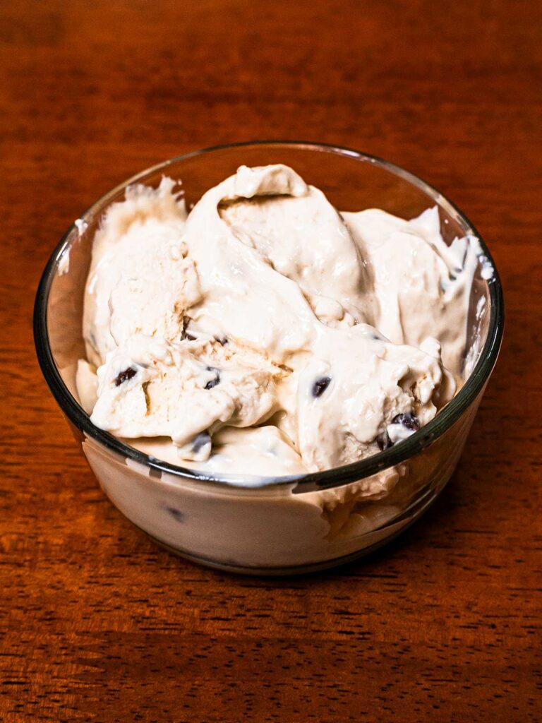 Cottage cheese ice cream recipe &ndash; creamy high-protein dessert in a glass bowl with fresh berries