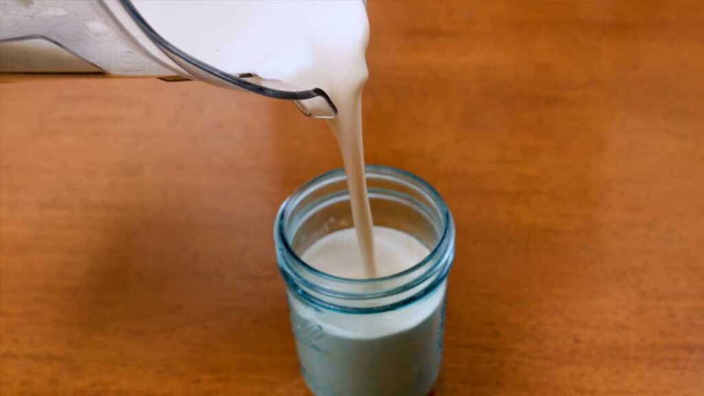 Iced vanilla protein latte overhead &ndash; high-protein coffee drink with condensation on glass