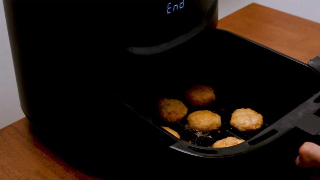 Keto canned chicken nuggets step-by-step - seasoning and mixing chicken ingredients