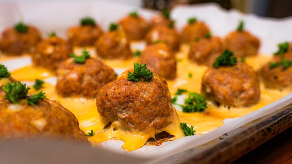 Keto turkey meatballs sliced open – juicy high-protein interior with parmesan crust