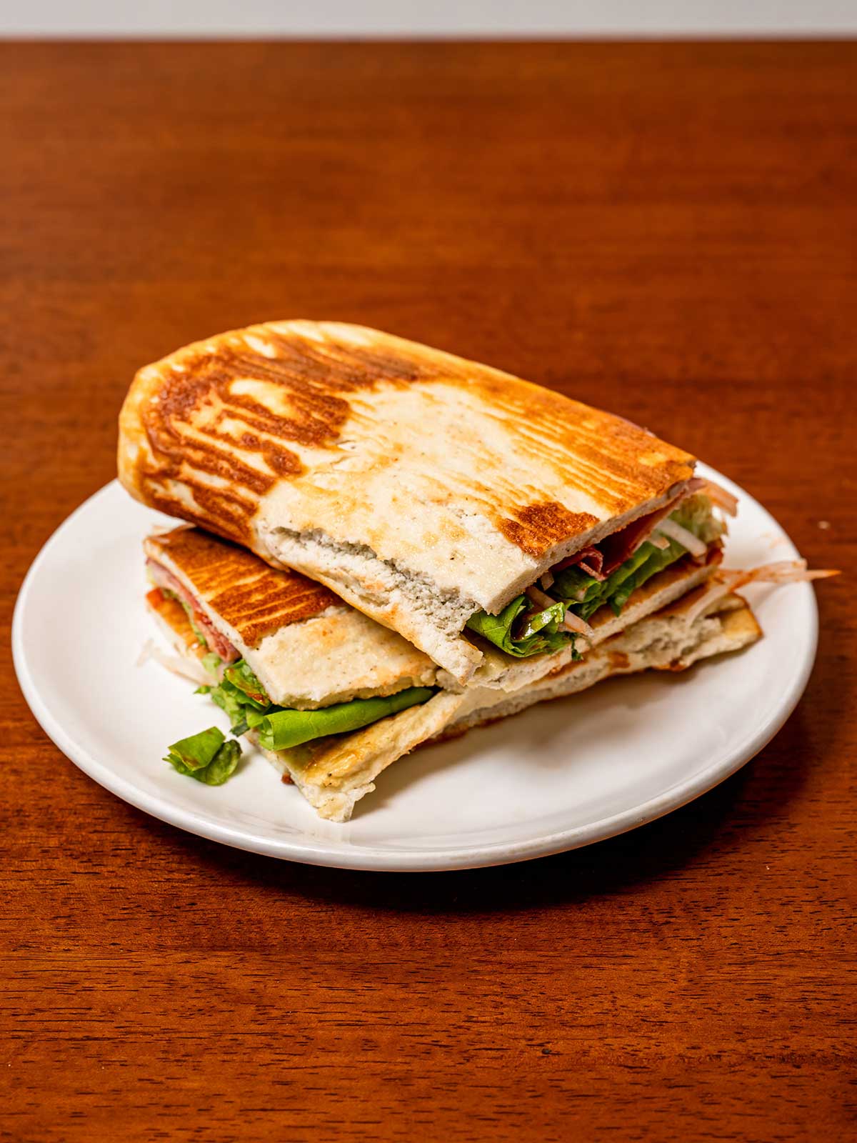 Low carb cottage cheese flatbread hero &ndash; soft high-protein flatbread with toppings on wooden board