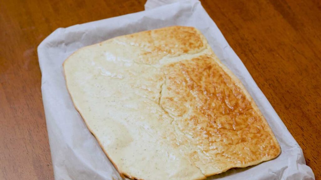 Low carb cottage cheese flatbread rolled with toppings &ndash; high-protein low-carb wrap recipe presentation