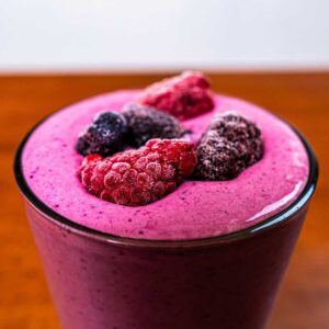 Mixed berry protein shake recipe card – high-protein smoothie with nutrition facts and ingredients