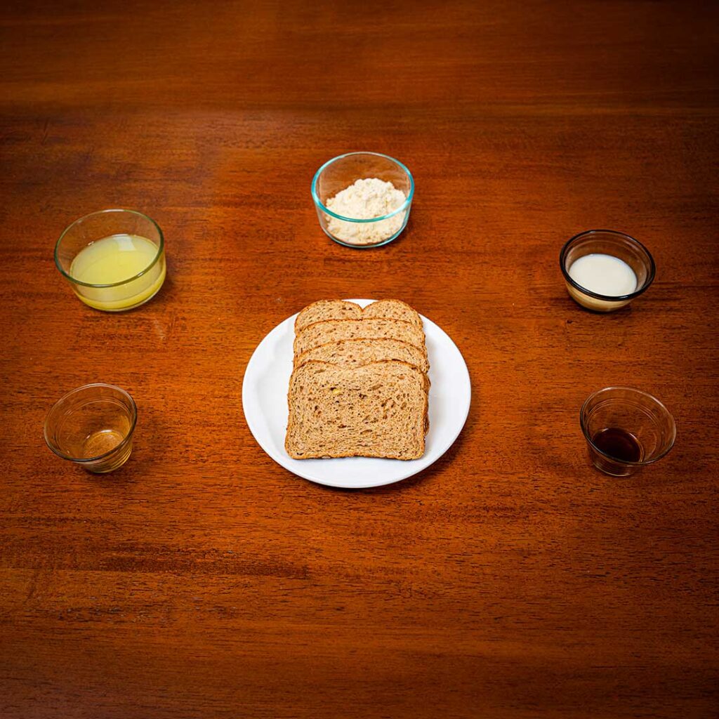 Protein French toast ingredients &ndash; bread, Greek yogurt, egg whites for high-protein breakfast