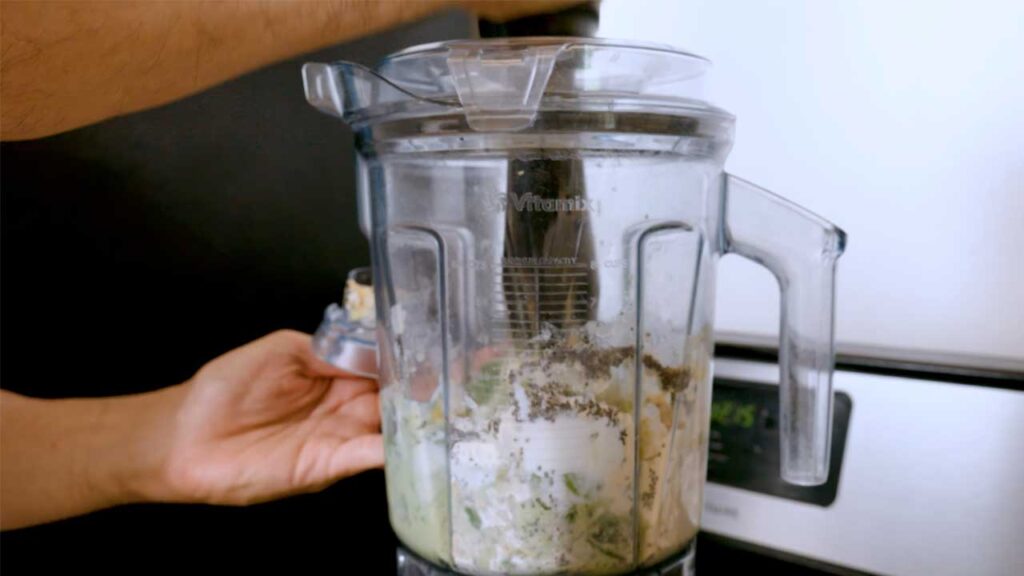 How to make tropical green protein smoothie &ndash; step 1: adding spinach and banana to blender