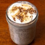 Banana cream protein overnight oats hero &ndash; high-protein breakfast with banana slices and oats