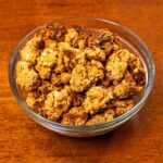 Protein granola hero shot &ndash; high-protein breakfast cereal with clusters and oats