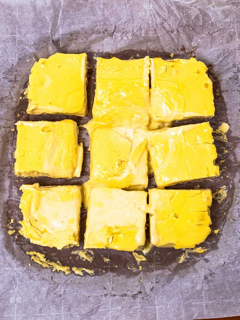 Protein lemon bars &ndash; high protein dessert with powdered sugar and lemon zest