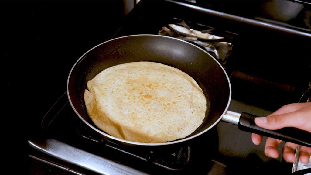 Making creamy chicken quesadilla – step 3: mixing filling ingredients for high-protein recipe