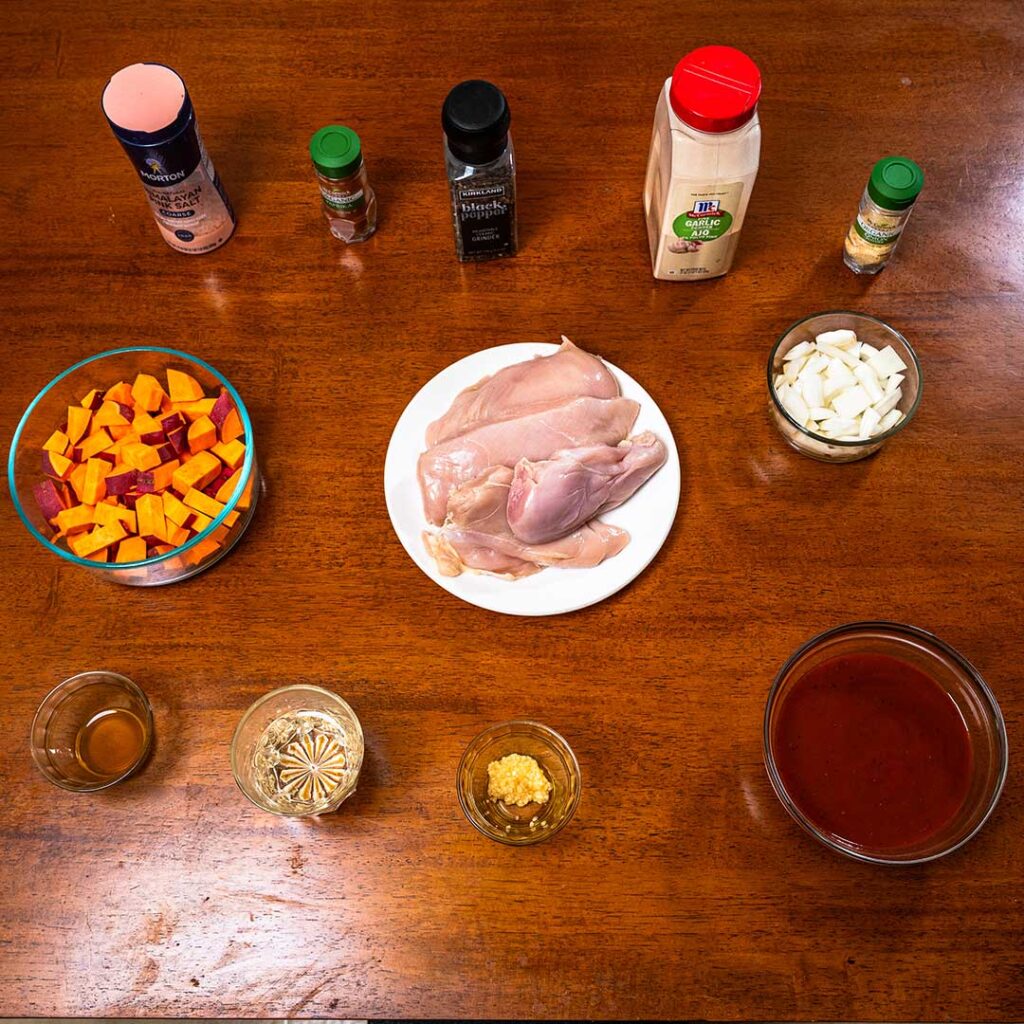 Slow cooker BBQ chicken and sweet potatoes ingredients &ndash; chicken, BBQ sauce, sweet potatoes