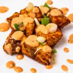 Air fryer bang bang salmon bites hero &ndash; high-protein air fryer salmon with bang bang sauce