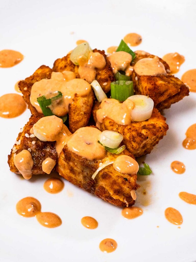 Air fryer bang bang salmon bites hero &ndash; high-protein air fryer salmon with bang bang sauce