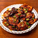 Air fryer korean chicken thighs hero &ndash; high-protein air fryer recipe with glistening glaze
