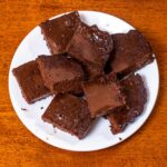 Cottage cheese chocolate brownies hero shot -- fudgy high-protein brownies on plate