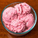 Cottage cheese strawberry ice cream hero, high-protein healthy dessert with fresh strawberries