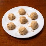 Low calorie protein energy balls hero, high-protein healthy snack with protein powder coating