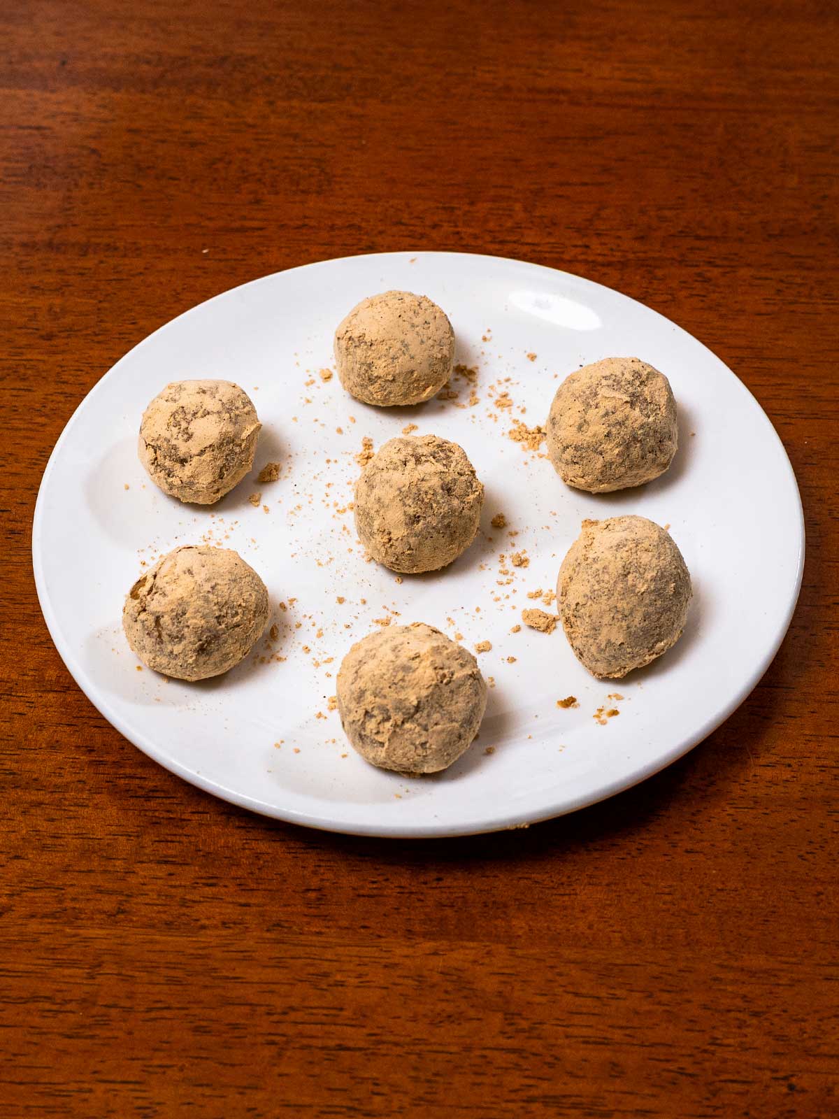 Low calorie protein energy balls hero, high-protein healthy snack with protein powder coating