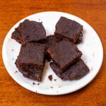 Protein brownies hero, high-protein fudgy dessert with rich chocolate texture