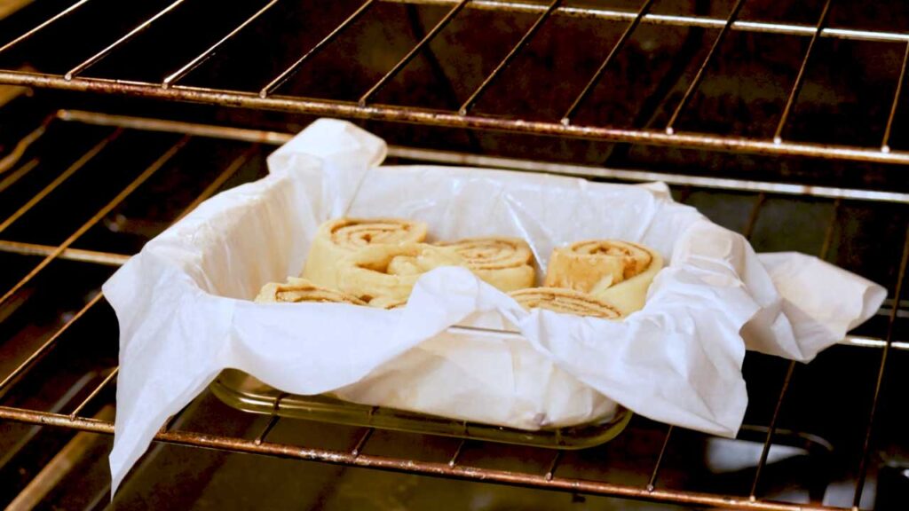 Protein cinnamon rolls angled shot &ndash; high-protein breakfast with cream cheese glaze and cinnamon swirl