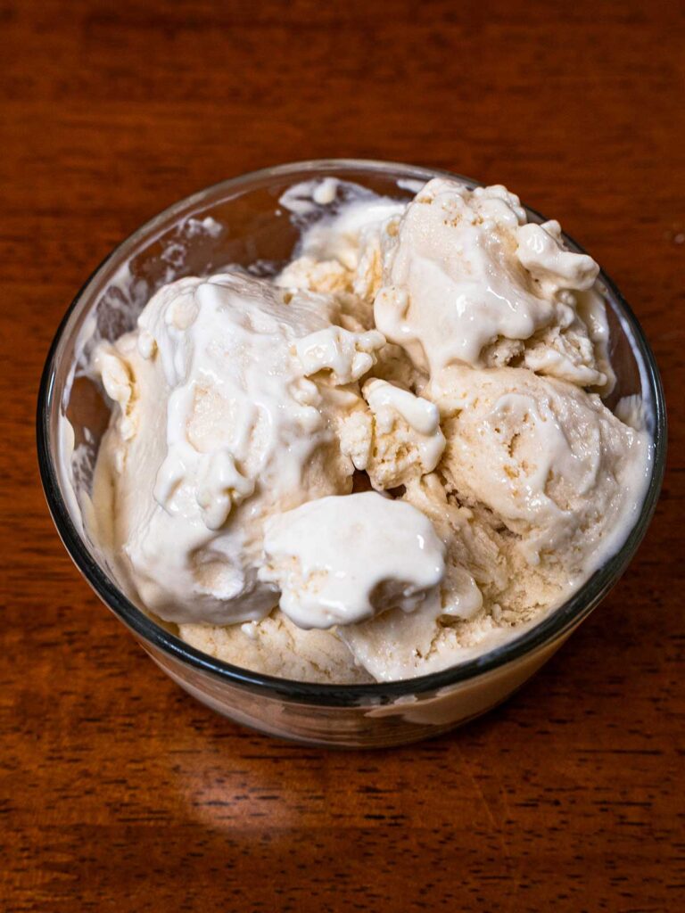 Protein vanilla gelato hero shot -- creamy high-protein Italian gelato in serving dish