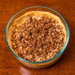 Pumpkin spice protein yogurt bowl hero shot -- Greek yogurt with pumpkin spice topping