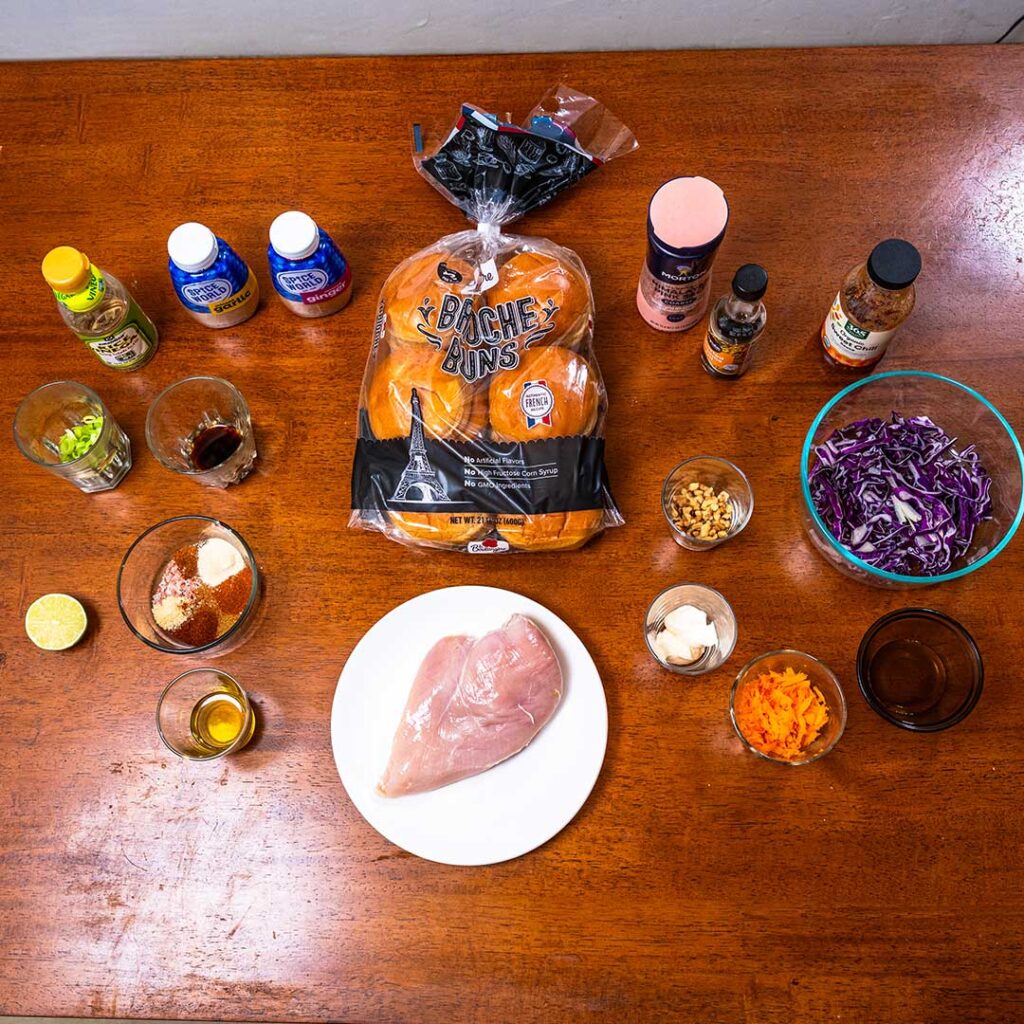 Spicy Asian chicken sandwich ingredients – grilled chicken, Asian slaw, spicy sauce