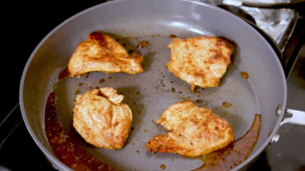Spicy Asian chicken sandwich side view – high-protein meal prep lunch