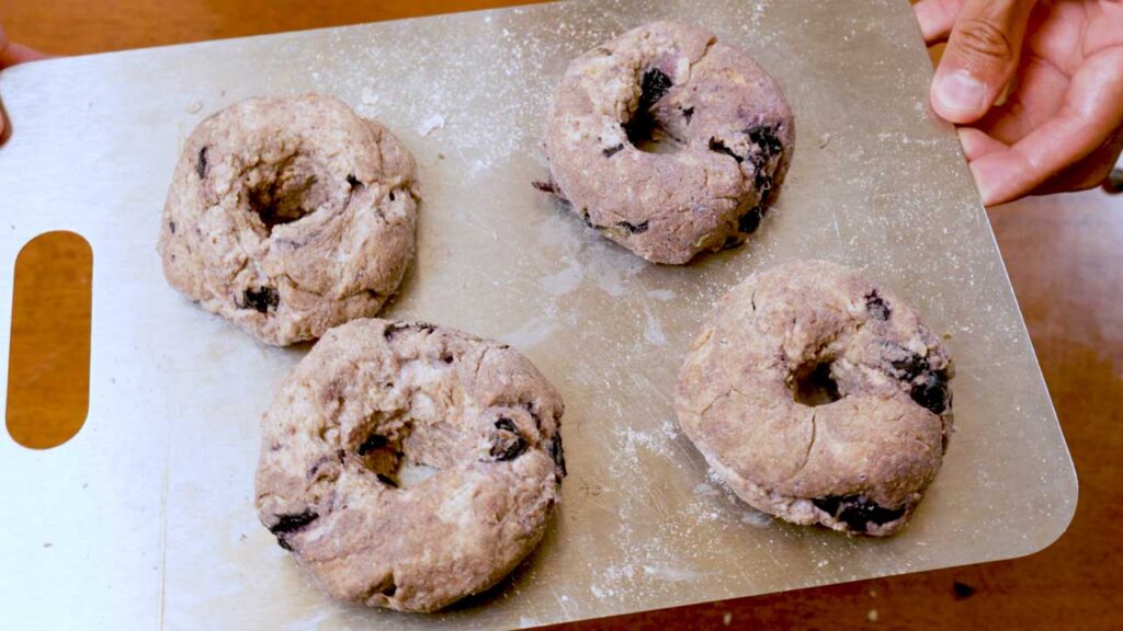 How to make blueberry Greek yogurt bagels &ndash; step showing bagel dough being shaped into rings
