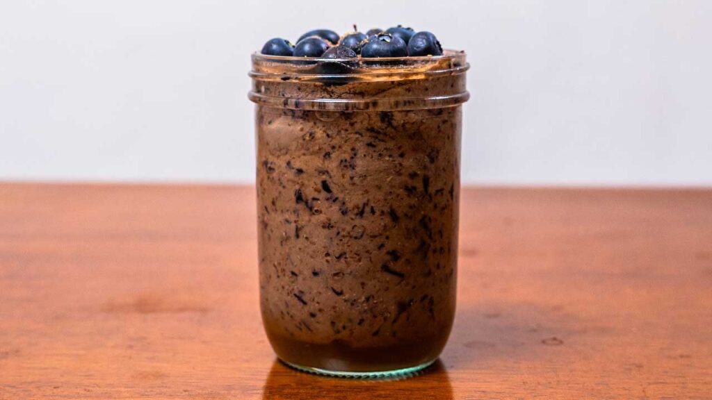 Blueberry vanilla protein smoothie final pour &ndash; high-protein easy smoothie recipe photo