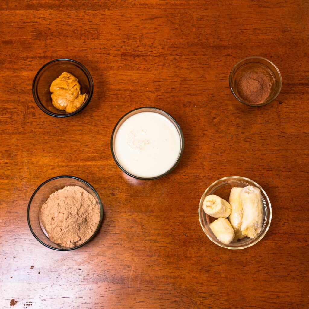 Chocolate peanut butter banana smoothie ingredients &ndash; banana, chocolate, and protein powder