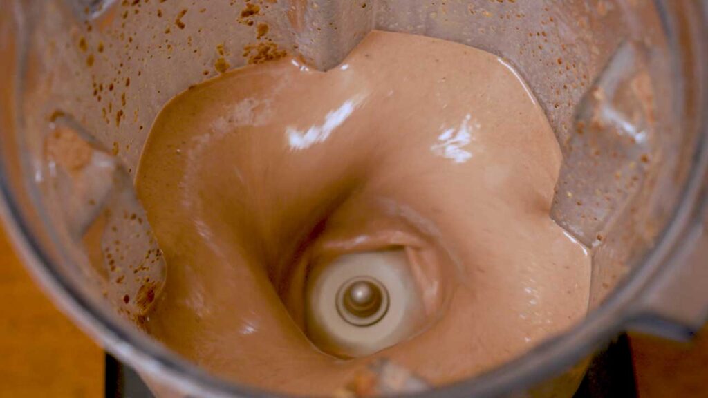 Making a chocolate peanut butter banana smoothie &ndash; quick high-protein process photo