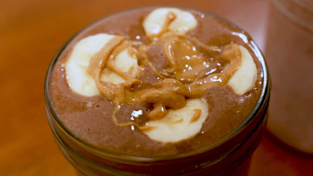 Chocolate peanut butter banana smoothie final pour &ndash; high-protein easy smoothie photo