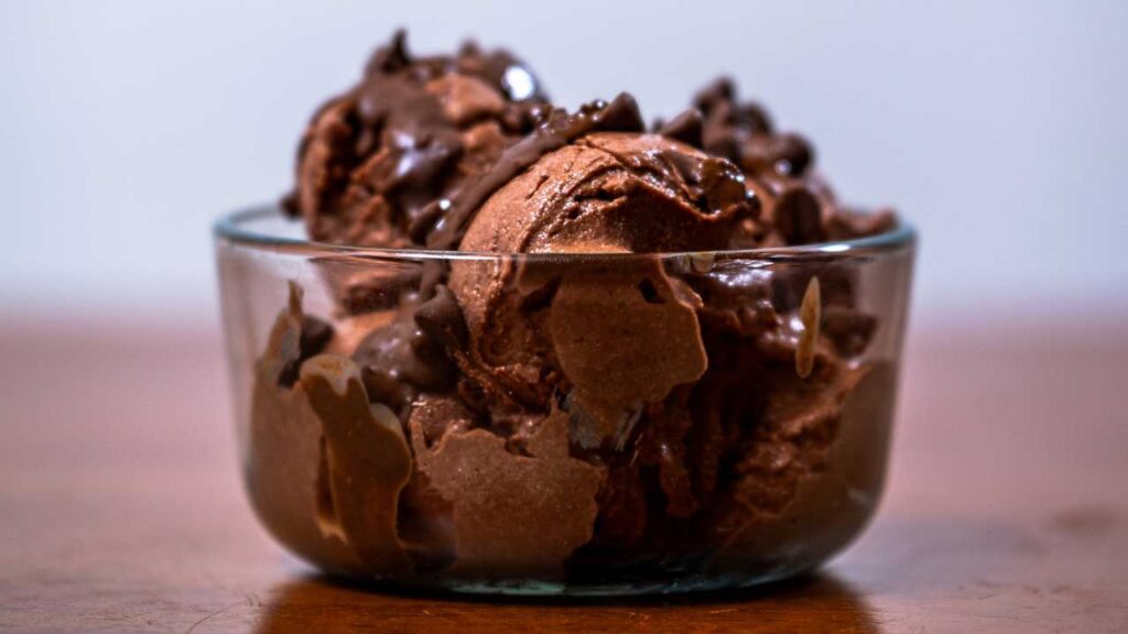 How to make cottage cheese chocolate ice cream &ndash; step showing close-up of creamy ice cream scoop