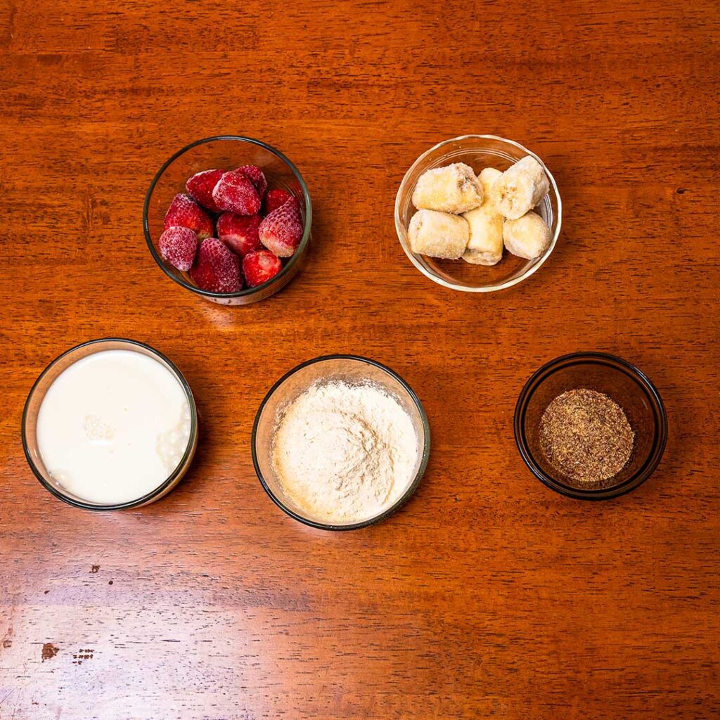 Strawberry banana protein smoothie ingredients &ndash; strawberries, banana, and protein powder