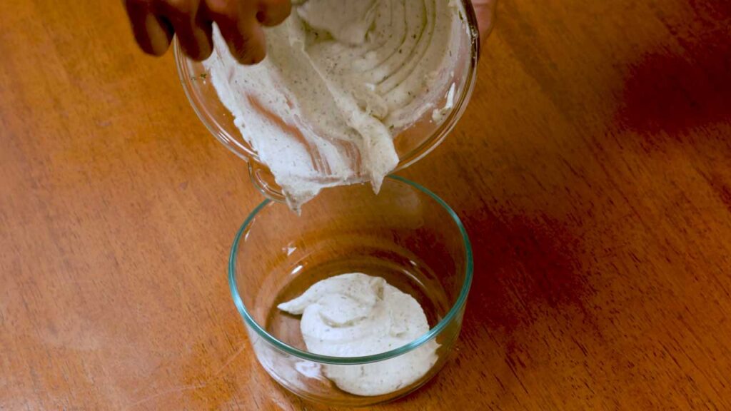 How to make whipped cottage cheese garlic dip &ndash; step showing ingredient blending process