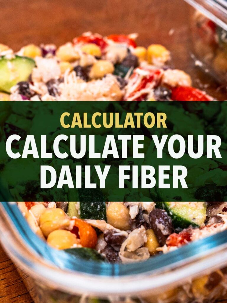 High-fiber chicken and black bean salad with corn, zucchini, and red peppers in a glass container