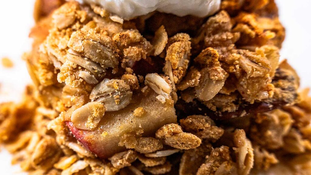 Close-up of the oat and pecan topping on high-protein apple crisp